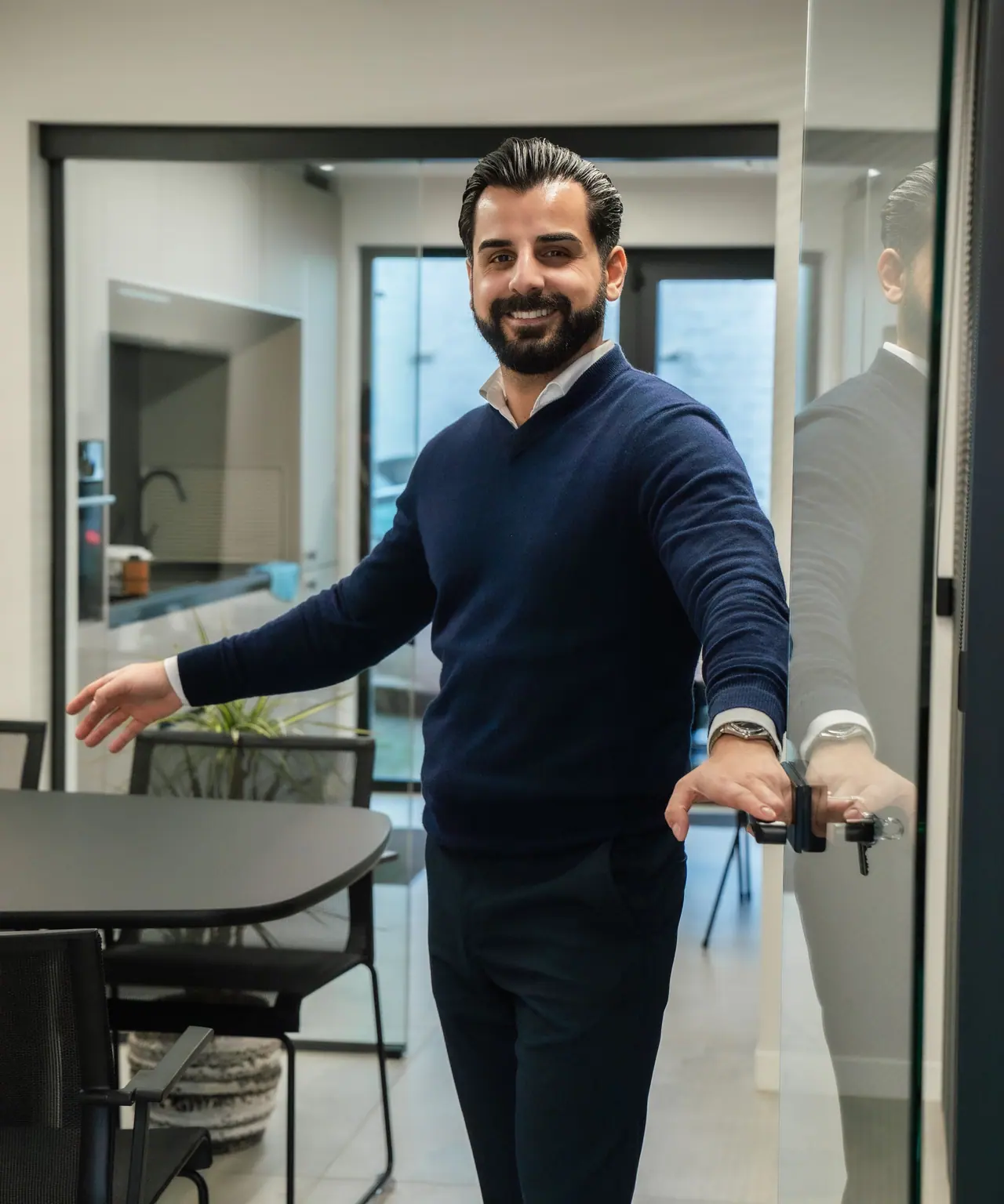 Is WordPress safe: someone holds a glass office door open, access you decide on