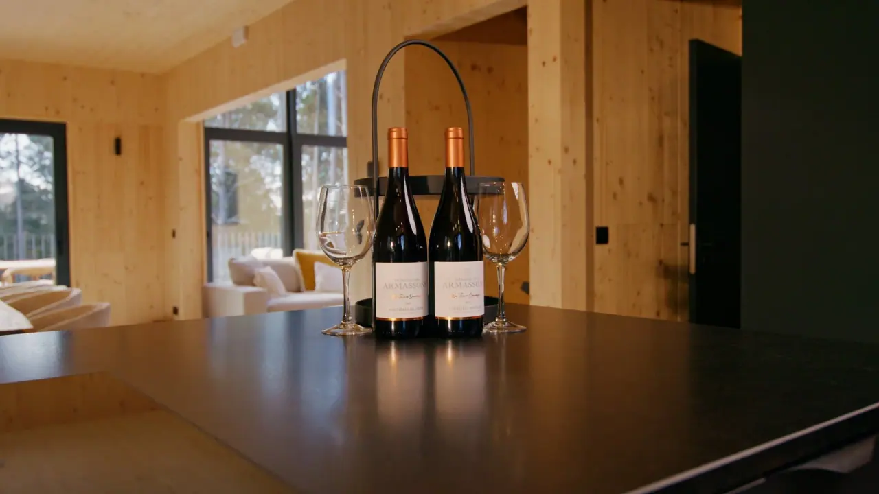 Two bottles of wine on the kitchen island at Les Terrasses de Durbuy