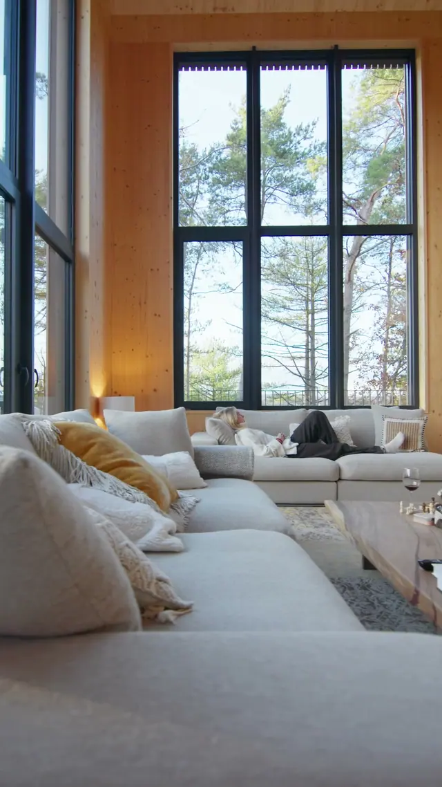 The living room of Les Terrasses de Durbuy from the launch reel