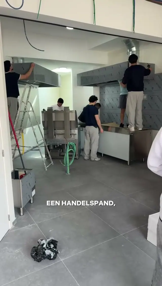 Workers on a commercial building, from the SN Group site reel