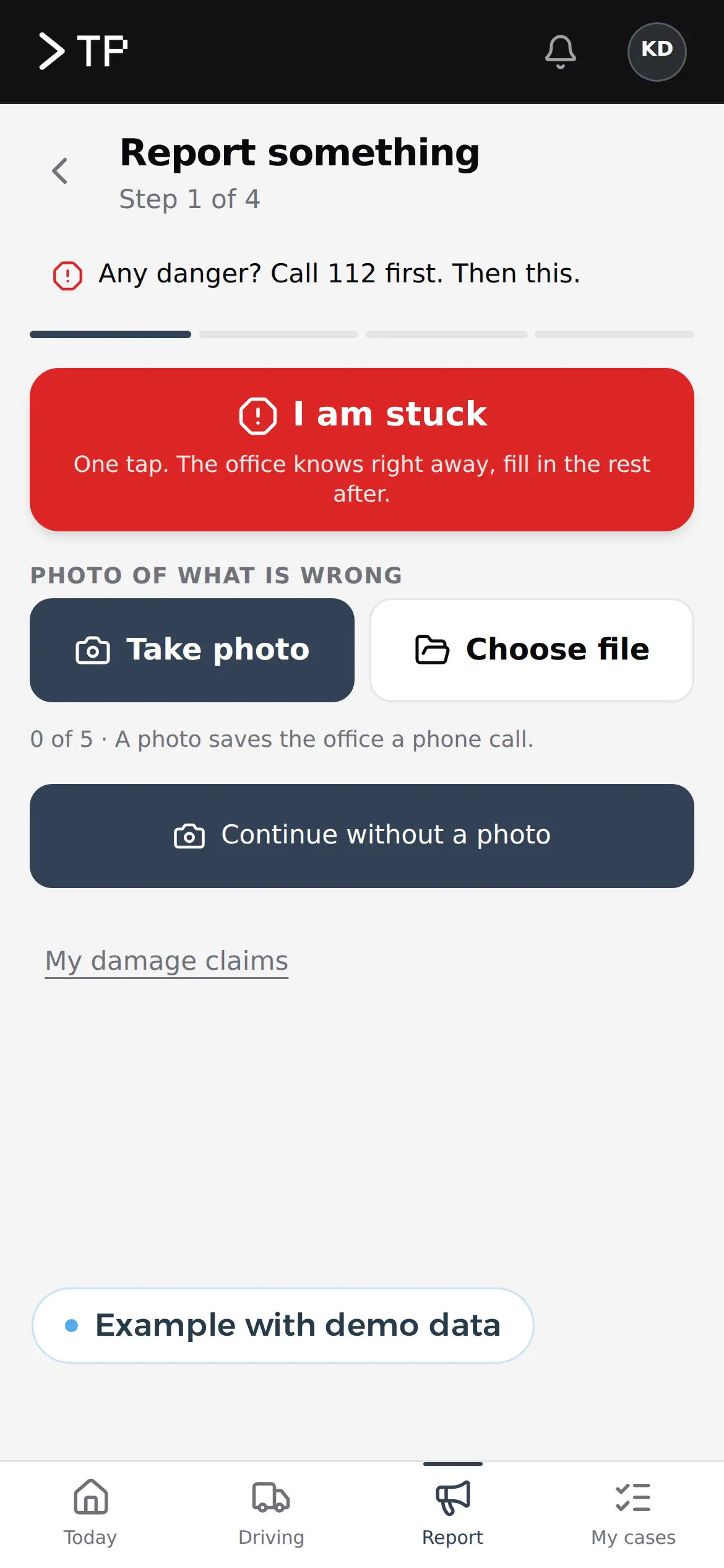 Step 1 of a report in the driver app: a button to say you are stopped and photos of what happened.